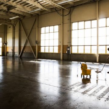 A freshly cleaned warehouse floor, a part of Industrial Cleaning Services in Peoria IL