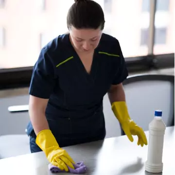 A cleaner is seen at work. Corporate Clean performs Healthcare Cleaning in Peoria County IL.