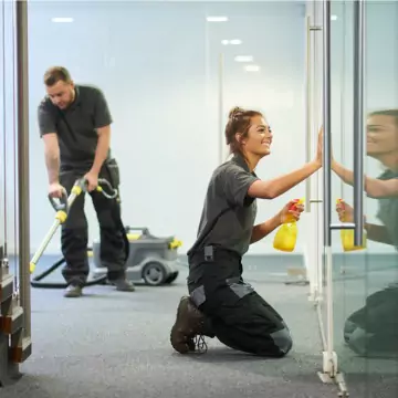 Workers are seen cleaning an office building. Corporate Clean is the best of the office cleaners in East Peoria IL.